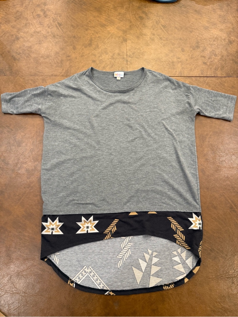 LuLaRoe Gray Short Sleeve Top with Black and Gold Patterned Layered Hem